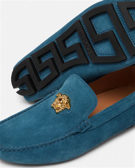 versace suede slippers.